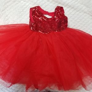 Red sequin tutu dress.